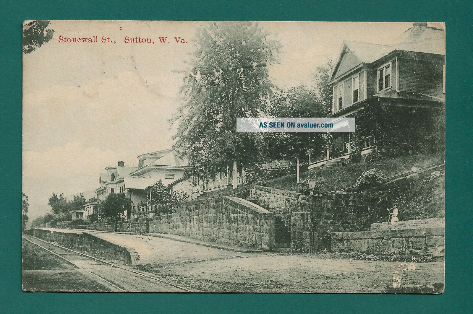 Sutton,  Braxton County,  WV postcard view of Stonewall St,  old houses,  1917